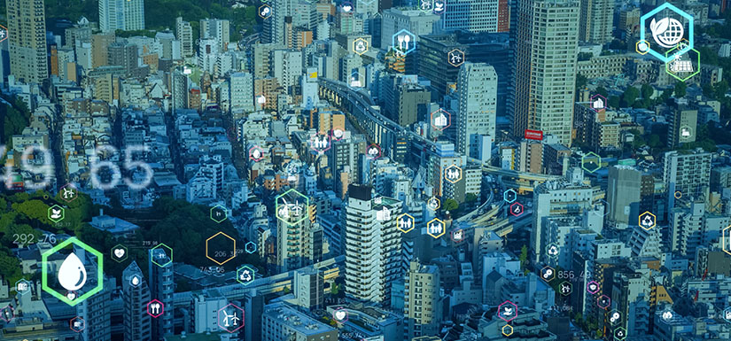 metrics-valuation-getty-body Aerial view of large metropolitan city with energy icons overlayed.