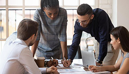 design-methods-istock-1176842719-cap Team members in meeting.