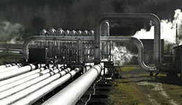 finance-business-istock-139888999-cap Pipes at geothermal power plant.